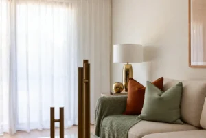 Living room color palette ideas using 60-30-10 rule with warm neutrals and terracotta accents